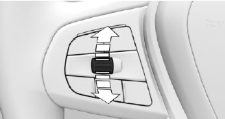 Press the rocker switch up or down once while