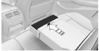 Fold the center armrest forward.