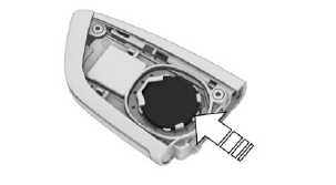 4. Insert a type CR 2032 battery with the positive